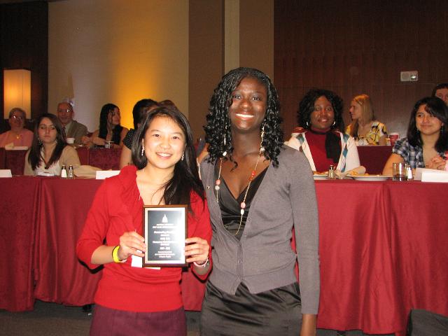 IMG_6859.JPG - Sunday morning:  House of Delegates, the Farewell Breakfast and awards presentations.  Governor Samah presents the “Outstanding Club President Award 2009-2010” to Amy Liu, Montgomery Blair High School. Congratulations!
