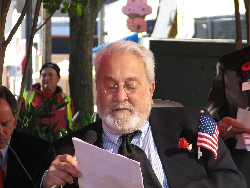 IMG_0002.JPG - Former U.S. Army Intelligence Captain Benedict Sonz read “In Flanders Field” the famous and moving poem from the Battle of Yepes, Belgium, in World War I. CPT Sonz’s grandfather served in The Great War.