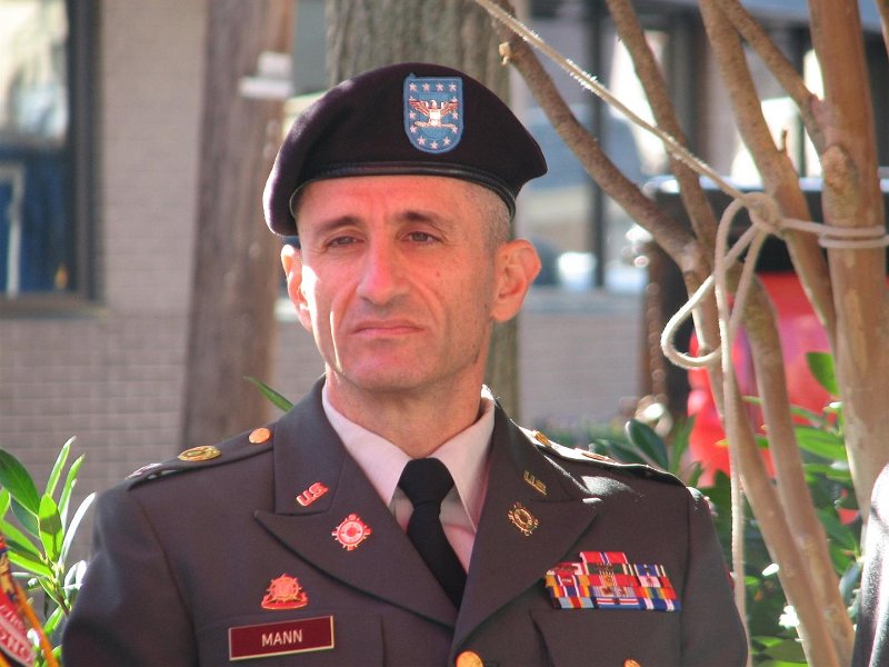 IMG_0014.JPG - The Key Note Speaker was Colonel Michael Mann, Deputy Commander for the 143rd Sustainment Command (Expeditionary) Unit. COL Mann spoke of his unit’s deployment in Afghanistan last year. They were responsible for sustaining all U.S. military personnel in Afghanistan with a full spectrum of logistic support, including water, food, ammunition, fuel and equipment. For his meritorious service throughout his deployment, COL Mann was awarded the Bronze Star Medal. He now serves the same unit in the Army Reserve now based in Orlando, Florida. As a civilian he works as an economist at the Department of Commerce in Washington. Thank you for your service, Colonel.