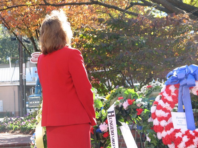 IMG_0021.JPG - After brief remarks by the M.C., the wreath presentations began. Each presenter was called and stepped up to their organization’s wreath, touch it, stepped back, some saluted … and the next was called with seventeen in all.