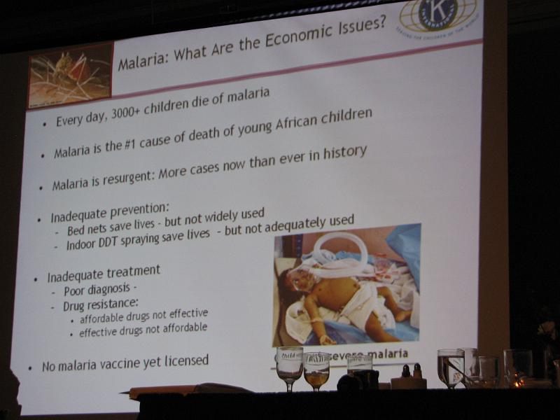 IMG_5924.JPG - The slide presentation was very informative.  For example, COL Heppner states while virtually eliminated in North America, malaria is on the resurgence in Africa and South East Asia.  There is inadequate prevention.  Bed nets saves lives, but are under used.  Indoor DDT spraying saves lives, but is not adequately used.  Affordable drugs are not effective and effective drugs are not affordable.  There is no vaccine yet.