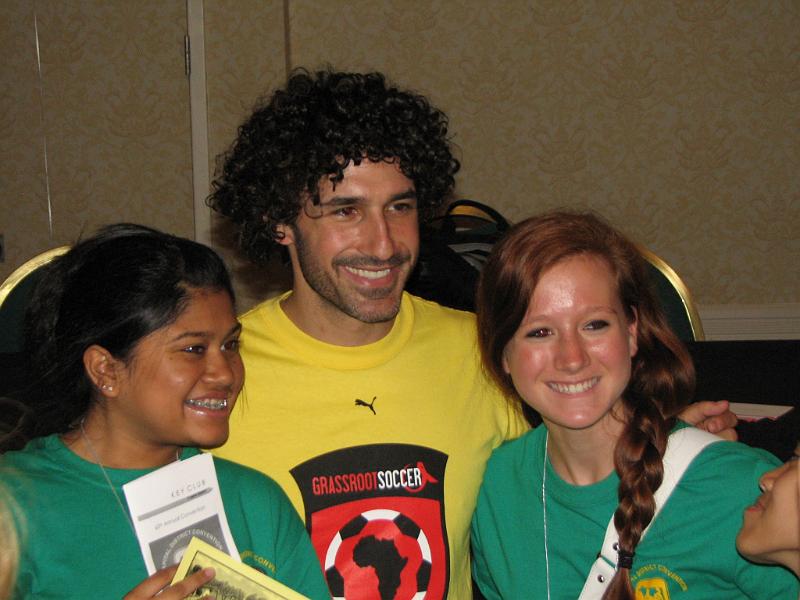 IMG_2485.JPG - The Keynote Speaker was a great hit:  Ethan Zohn was the winner of one million dollars on ‘Survivor: Africa’, the realty TV show and is the co-founder of Grassroots Soccer (GRS) a non-profit organization that trains professional soccer players to teach African children about AIDS/HIV prevention.  He turned his winning into helping many organization help youth and has been affiliated with Key Club International for the past several years.  Since its founding, GRS has ‘graduated’ over 230,000 youths and hopes to graduate one million African youths by 2010.  He turned his winning into a big way “One Can Make A Difference
