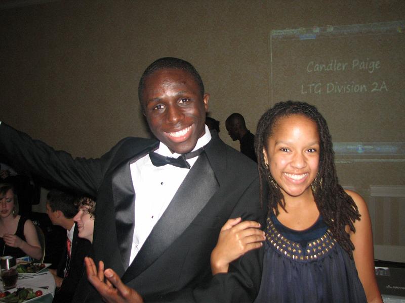 IMG_2523.JPG - At the Awards Banquet, it is tradition to have the District Board and current Lieutenant Governors presented.  Each was dressed in their best and looking spectacular. Here are a few to represent your Key Club leaders.  John Bangura, LG Division 1 and his guest.