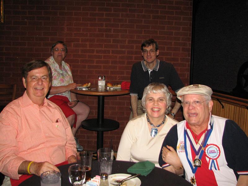 IMG_3728.JPG - Hampton Roads Region’s District Trustee Elect Doc Thrush with Jane and PLG H.L. Marks are ready, too.  David Lurie, Tysons Club is in the background.