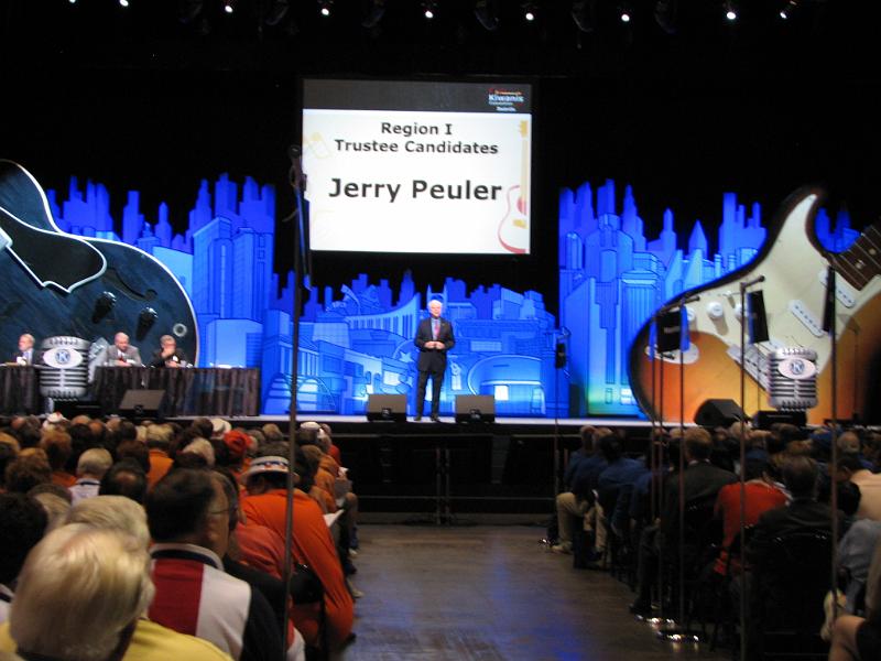 IMG_3819.JPG - Jerry Peuler addresses the delegates and guests from the stage as one of five Trustee candidates.  You’re on you own up there, even though the CDK is behind you.