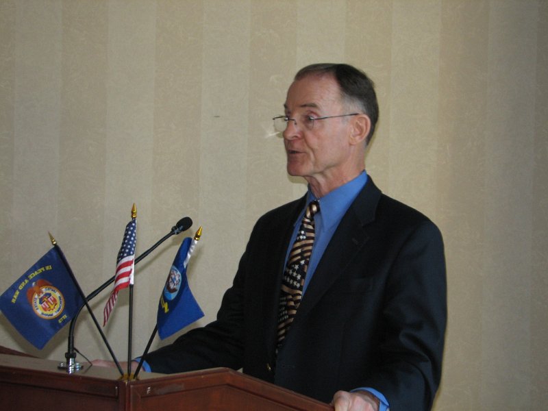 IMG_7748.JPG - Our Master of Ceremonies for the evening was U.S. Navy Captain (Ret) Michael Cronin who was a Navy aviator during the Vietnam War, was himself a POW for many years after being shot down over North Vietnam.