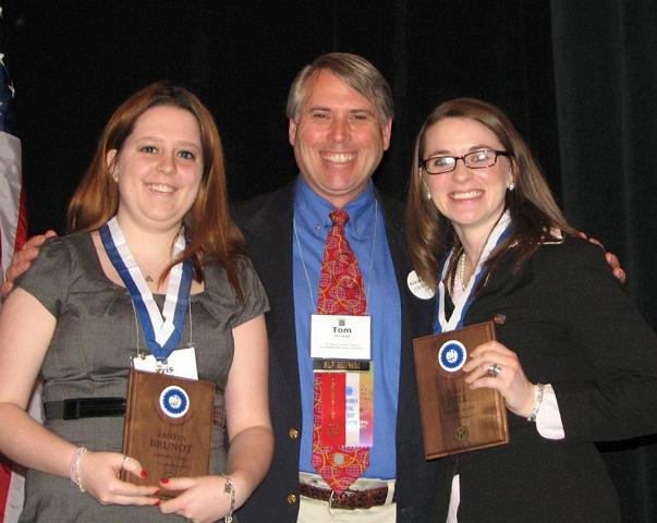 IMG_6392.JPG - Immediate Past Governor Tom Ganse presented two prestigious Carthage Pullman Society awards to CKI’s Kristen Brudt and Kelli Hill.