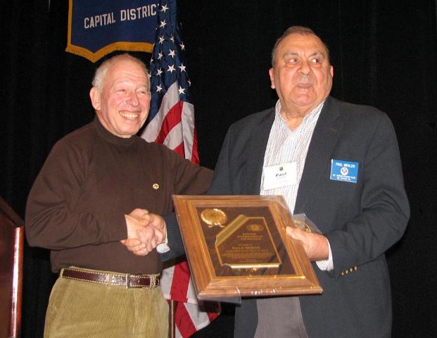 IMG_6441.JPG - Paul Mehler of the Mt. Vernon Kiwanis Club gave us a laugh when he came up to the stage to take a picture of the recipient of a Kiwanis International Foundation recognition award plaque, when he found out at the stage that HE was the recipient.  Club President Bruce Malkin presented the award with thanks.  Paul was surprised.  Good fun.