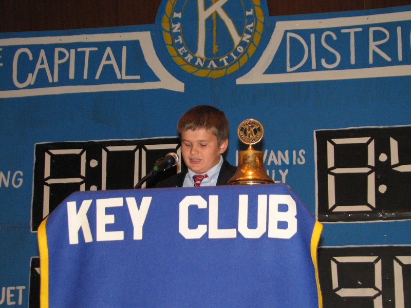 IMG_0709.JPG - The General Session, as the term implies, brings all attendees together for the business meetings of the DCON.  One of the traditional events at all annual K-Family conventions is the presence of the K-Family itself, bringing Kiwanis Family Greetings.  This shows how the Kiwanis organizations now flow from the youngest time called K-Kids, those in elementary school.  K-Family experiences provide the advantages of learning how working together helps to accomplish more meaningful community service. Key Club LG Carter Black introduced K-Kids Representative Jesse Pasierb. It was impressive to hear his message and see his composure.  Neeta Singh, Representative of Builder’s Clubs, and CKI Governor Brian Cofrancesco (picture shown earlier) give message of support to Key Clubs for their leadership in the K-Family in their addresses to the DCON.