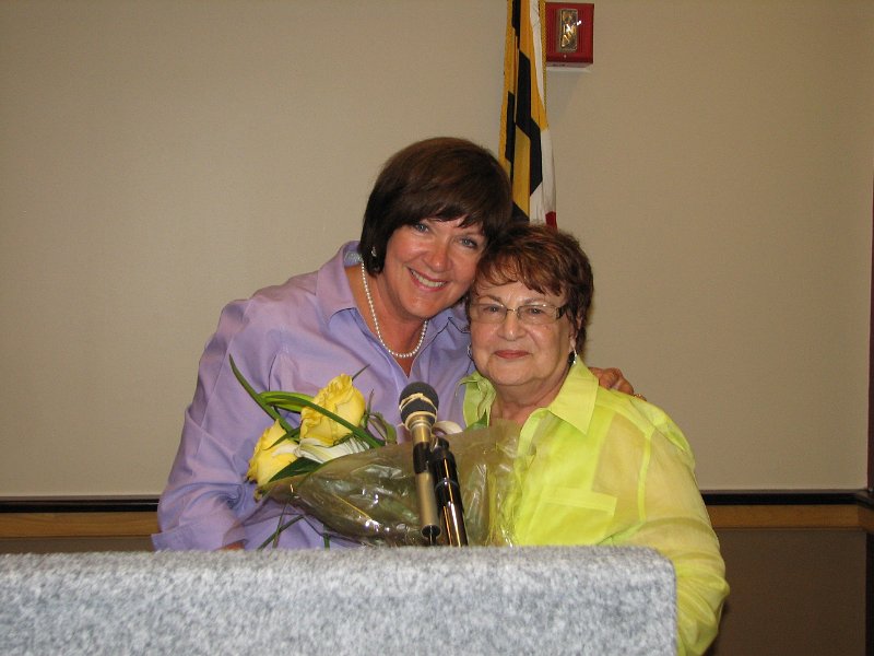 IMG_5401.JPG - President of the Potomac Kiwanis Club Nancy Cressy presents roses to Lt. Governor Joyce Sharon as a token to Division 17’s appreciation of her leadership during the 2011-2012 Kiwanis Administrative Year.  Great Job, Joyce.  Thanks you !  President Nancy also named President Elect Mike Cronin as the Potomac Club’s “Unsung Hero” for his leadership on the Club’s annual Armed Forces Day Dinner for our Wounded Warriors and his successful launch of the club’s new “Potomac Kiwanis Foundation of Maryland, Inc.”  Mike starts his reign October 1st and the Installation Dinner will be Tuesday, October 11th, 6 PM, at the Marriott Suites, 6711 Democracy Blvd., Bethesda.  Join them with an interclub Division 17!