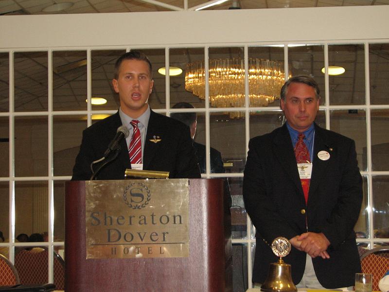 IMG_4473.JPG - By Laws & Policy Chair Troy Dibbly, DC Young Professionals Club, presents the Amendments for approval while Gov Tom presides at the Delegate Session I.