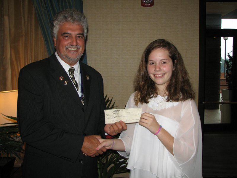 IMG_1913.JPG - Teenager of the Year Chairman, Roger Diehl, presents a check for $2000 to Teenager of the Year, Nicole Muller.