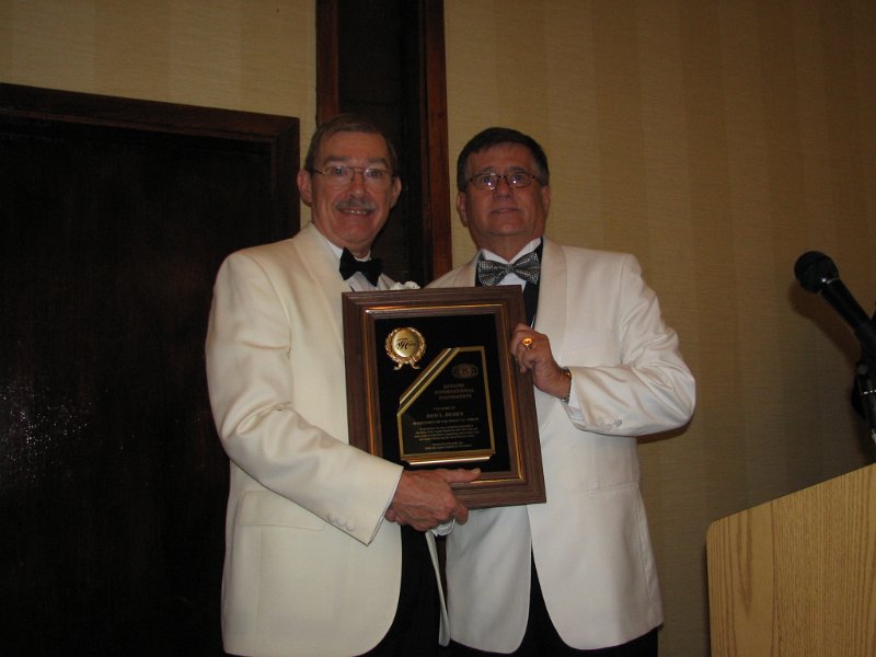IMG_1960.JPG - Governor Don is presented a Kiwanis International Foundation Tablet of Honor by LTG Tom Wagstaff on behalf of the 2009-10 class of LTGs. The Tablet of Honor  was to recognize and thank Governor Don for his outstanding leadership and support of Kiwanis and the Kiwanis family.