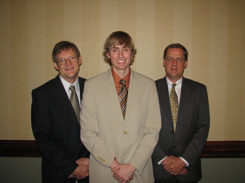 IMG_1975.JPG - Inspirational Breakfast speaker Cyrus Hinkson (center) is flanked by his father Craig Hinkson (left) and Kiwanian Glenn Updike (right).