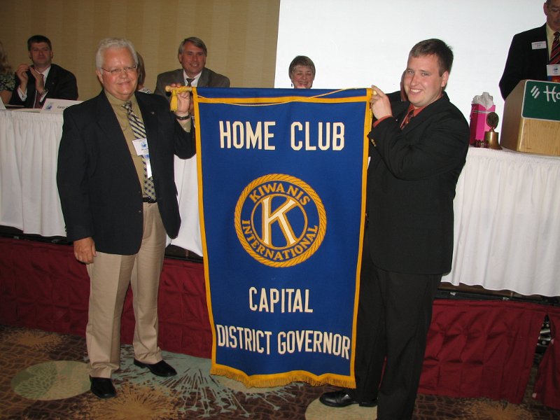 IMG_2039.JPG - Exchange of Governor Banner from Reisterstown Club to the Ashland Club; President James Lichty Reisterstown Club and Derek Dupuis of the Ashland Club.