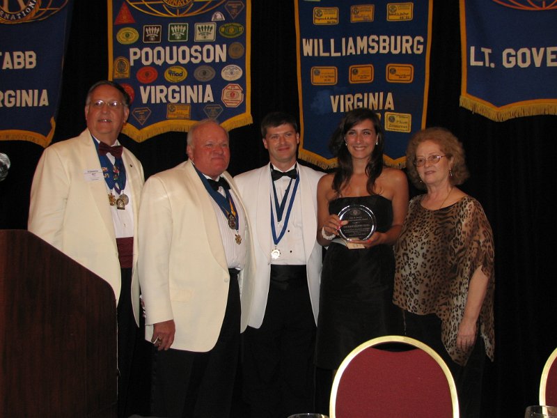 150.JPG - This Convention brings all of us a great moment of pride and admiration, thankfulness and respect, appreciation and thanks to Ellis H. Stroup as he announces his retirement as the Capital District Kiwanis Secretary-Treasurer. Ellis has served all of us faithfully for almost 37 years. It is with great respect and thanks that we honor his work and wish him a Happy Retirement as well. In Ellis’ honor and in his name, PG Art Riley announced this first ever a $5,000 scholarship award. Pictured are Past Governor Art Riley, Governor Tom Varner, Governor Elect Jeff Wolff and scholarship recipient Kristen Elizabeth Craig. Congratulations!It reads:  The Ellis H. Stroup Key Club Leadership AwardPresented ToKristen Elizabeth CraigBy the Capital District Kiwanis FoundationIn Recognition of Outstanding Service Leadership to Key ClubAugust 20, 2011