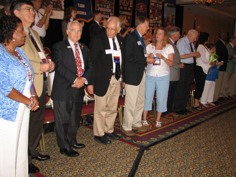157.JPG - Outgoing officers all line up for their past position pins and our sincere thanks.