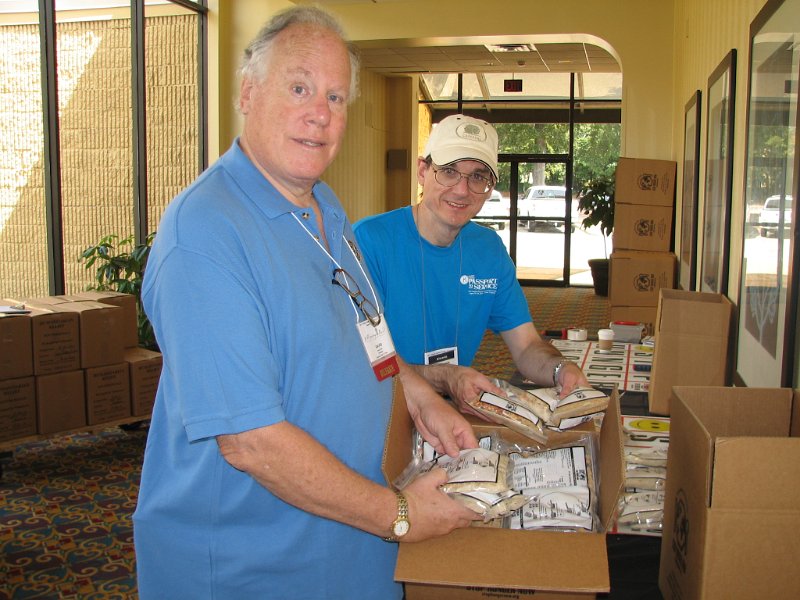 IMG_5127e.JPG - Packing boxes with meals to be shipped overseas.